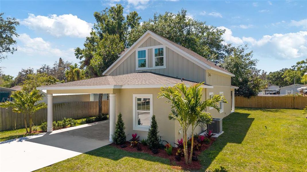Front exterior of a new home in , Plant City, FL, highlighting curb appeal (Image 2).