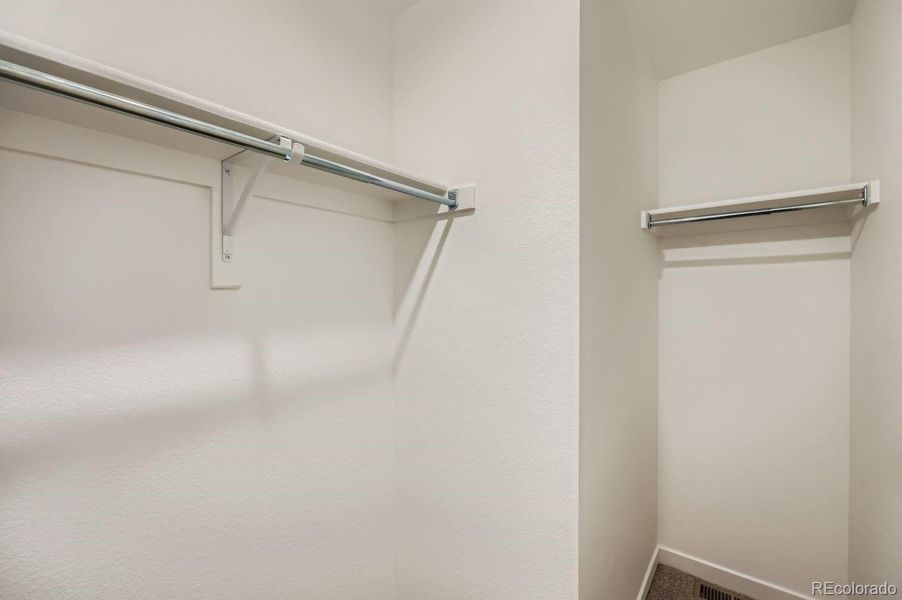 Spacious, unfurnished interior of a new home in Percheron: The Explorer Collection, Colorado Springs (Image 10).