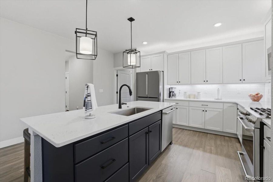 The kitchen has an open layout and plenty of counterspace