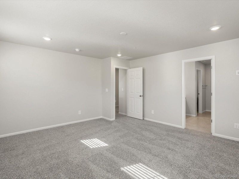 Spacious, unfurnished interior of a new home in Buffalo Highlands: The Flora Collection, Commerce City (Image 27).