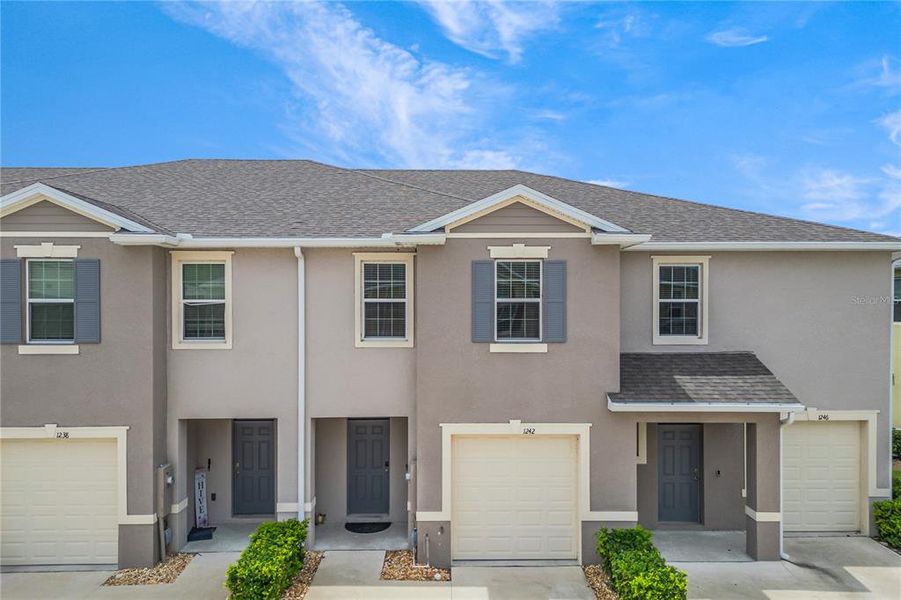 Front exterior of a new home in , Howey-in-the-Hills, FL, highlighting curb appeal (Image 18).