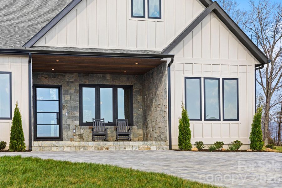 Exterior details and patio area of a home in , Fletcher (Image 28).