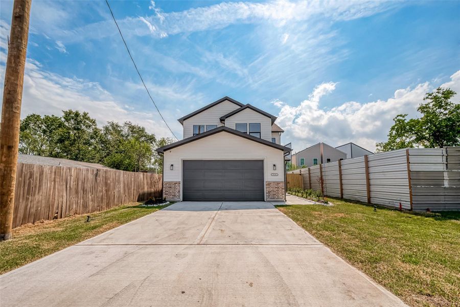 Front exterior of a new home in , Houston, TX, highlighting curb appeal (Image 22). Front exterior of a new home in , Houston, TX, highlighting curb appeal (Image 22).