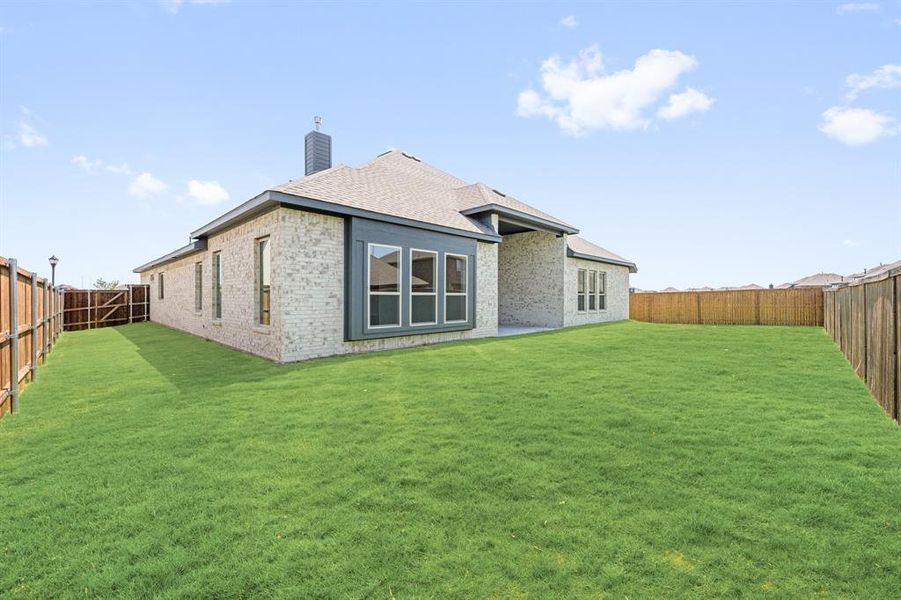 Front exterior of a new home in Somerset Classic 70s & 80s, Mansfield, TX, highlighting curb appeal (Image 19). Front exterior of a new home in Somerset Classic 70s & 80s, Mansfield, TX, highlighting curb appeal (Image 19).