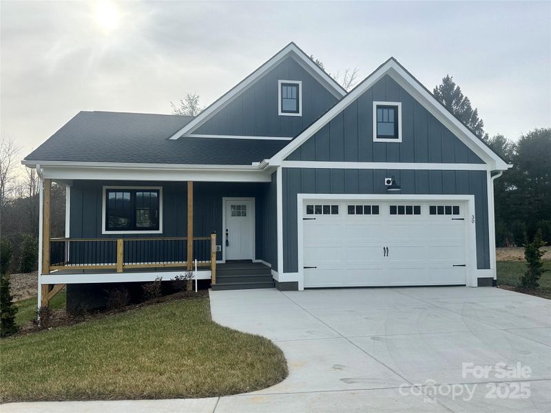 Front exterior of a new home in , Hendersonville, NC, highlighting curb appeal (Image 20).