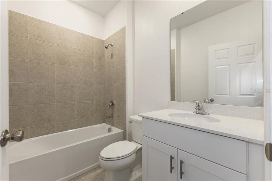 Furnished interior view inside a new home in Mirror Lake Village, Fruitland Park (Image 6).