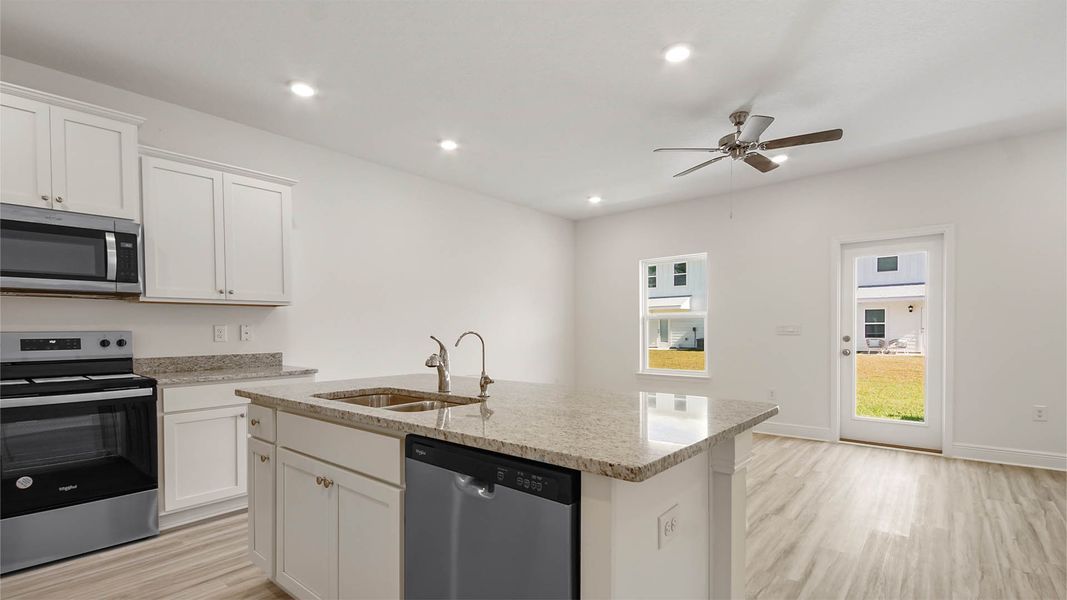 Furnished interior view inside a new home in Bayside at Ward Creek, Panama City Beach (Image 6).
