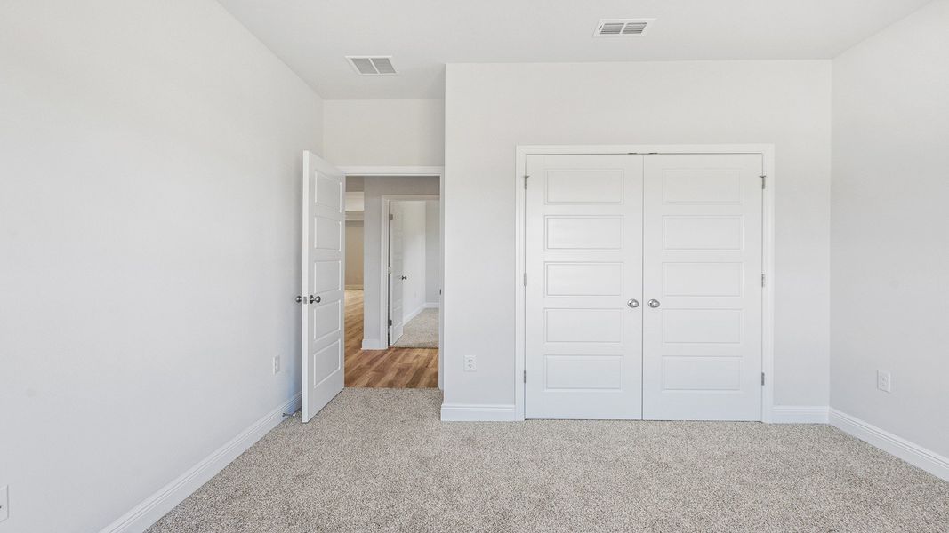 Representative unfurnished interior of a home built from the The Hawthorne by D.R. Horton in Meadows at Rehwinkel, Crawfordville (Image 10).