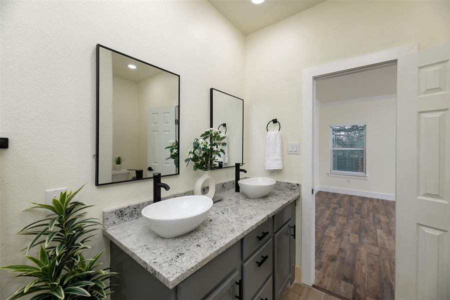 Granite counters in primary bathroom.