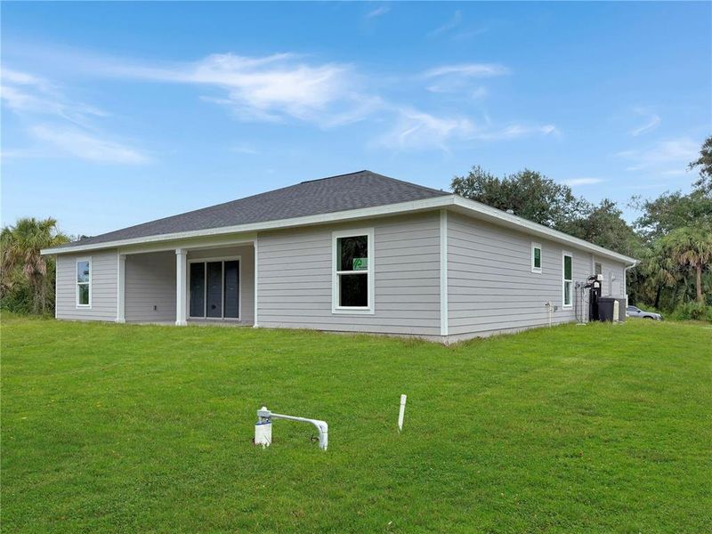 Front exterior of a new home in , Port Charlotte, FL, highlighting curb appeal (Image 20).