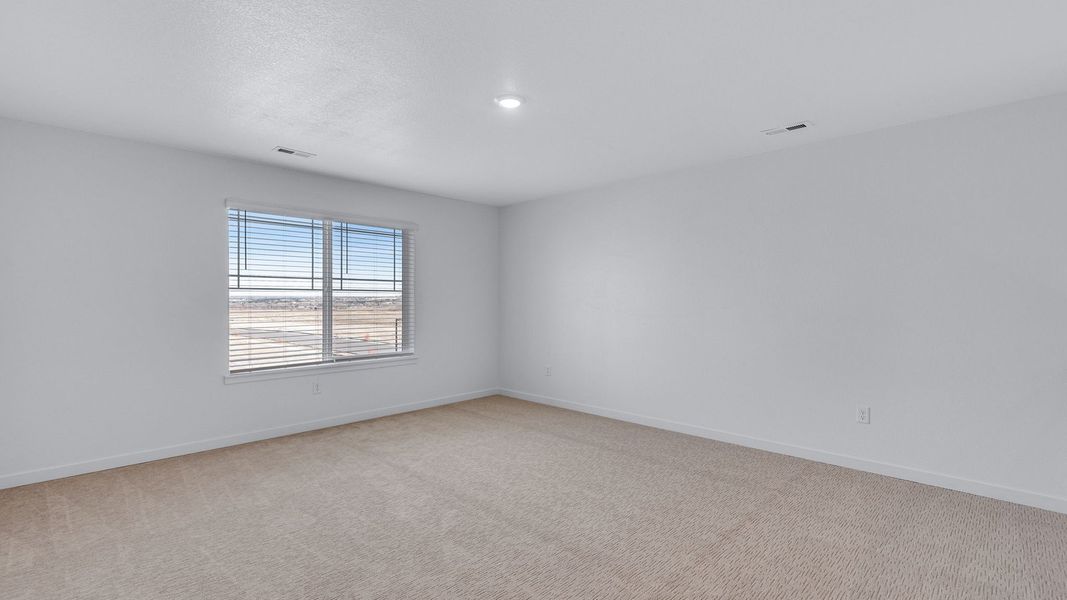 Spacious, unfurnished interior of a new home in Trails at Crowfoot, Parker (Image 18).