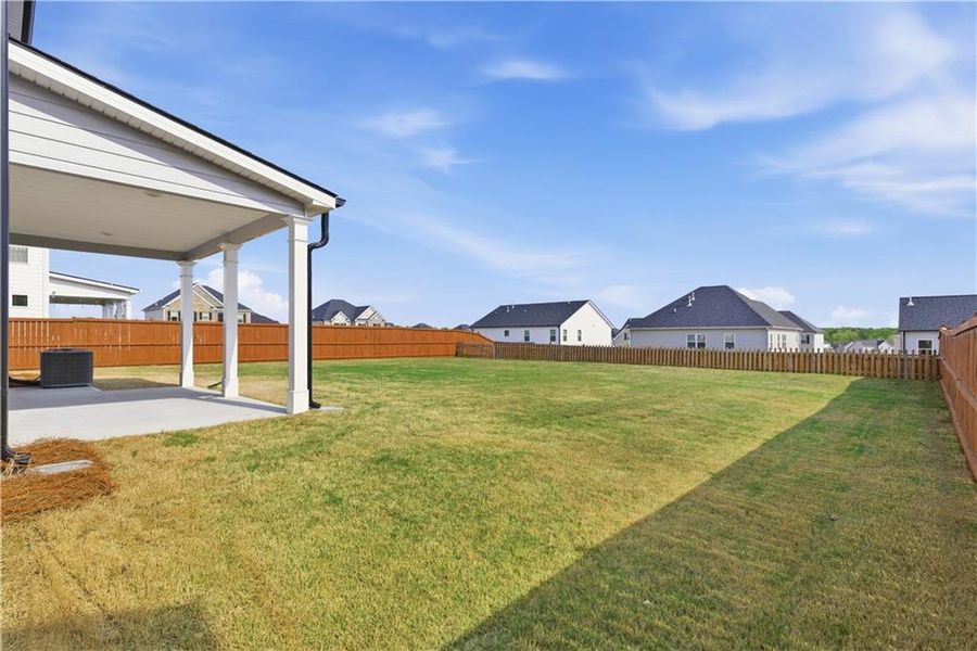 Exterior details and patio area of a home in Independence, Loganville (Image 4).