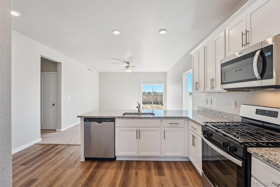 Furnished interior view inside a new home in Cottonwood Greens, Fort Lupton (Image 7).