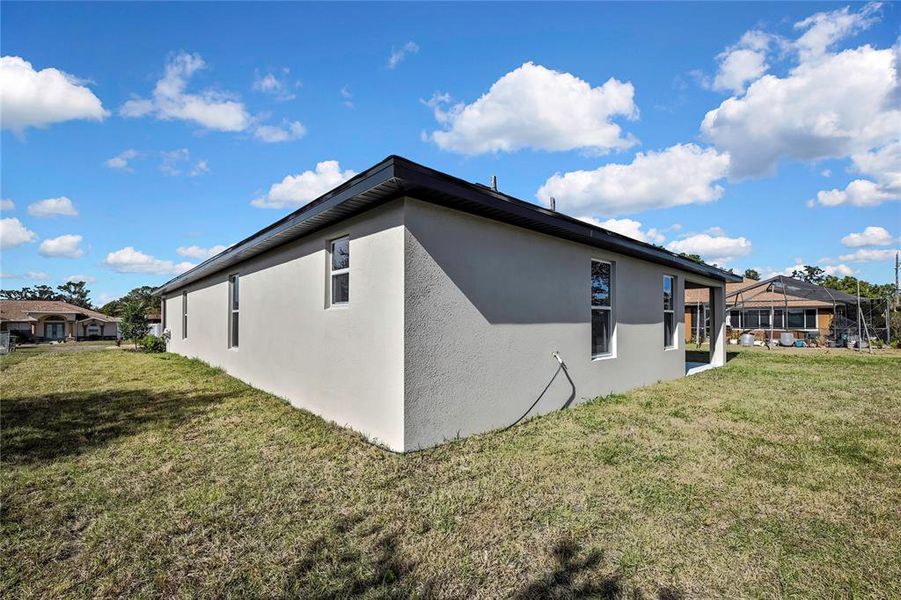 Exterior details and patio area of a home in , Spring Hill (Image 3).