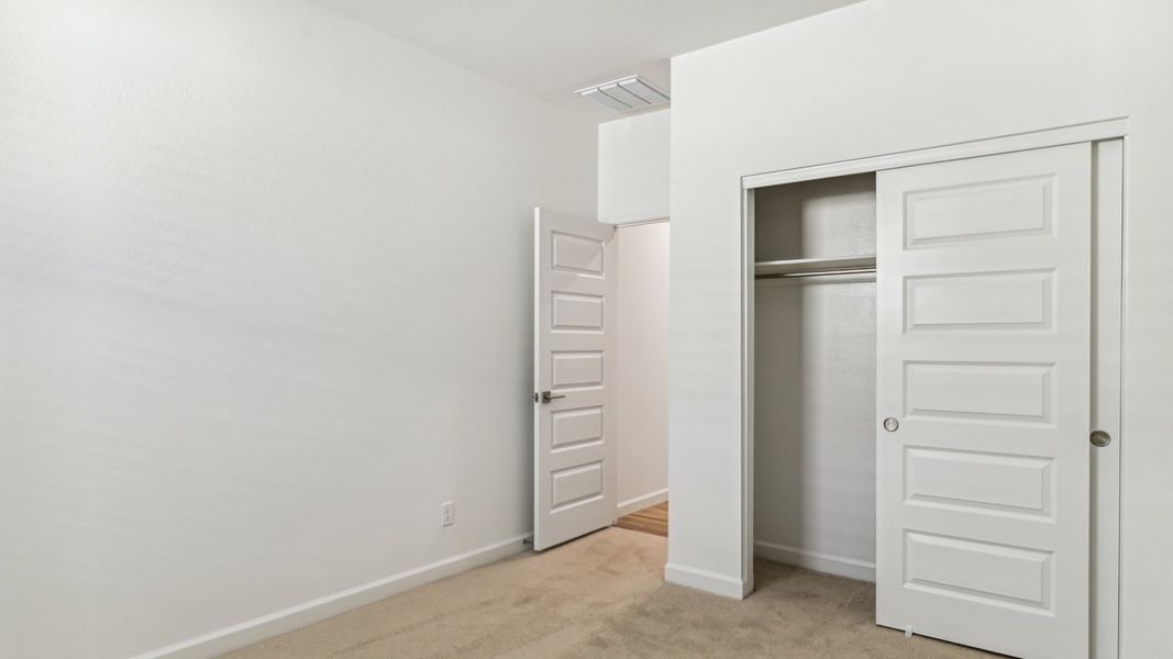 Representative unfurnished interior of a home built from the Cobalt by D.R. Horton in The Ridge at Stone Butte, Phoenix (Image 21).