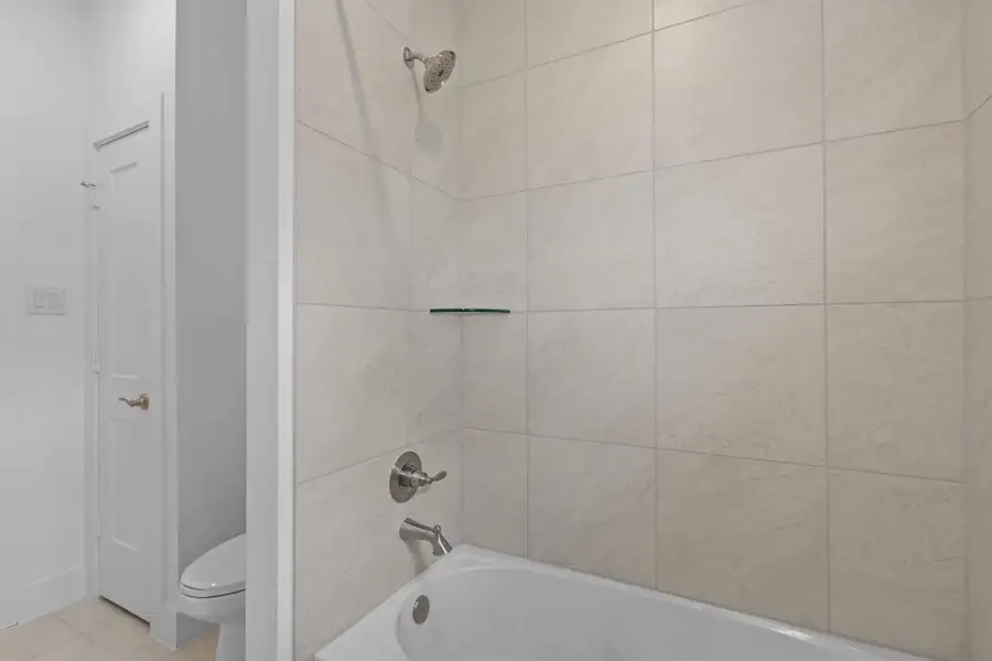 Furnished interior view inside a new home in Wood Leaf Reserve, Tomball (Image 11).