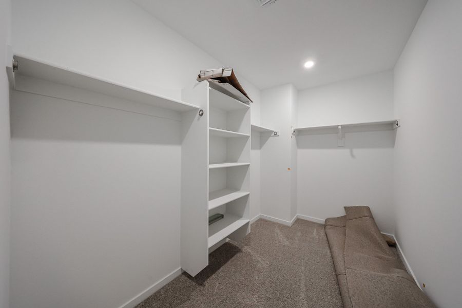A room with white shelves. A room with white shelves.