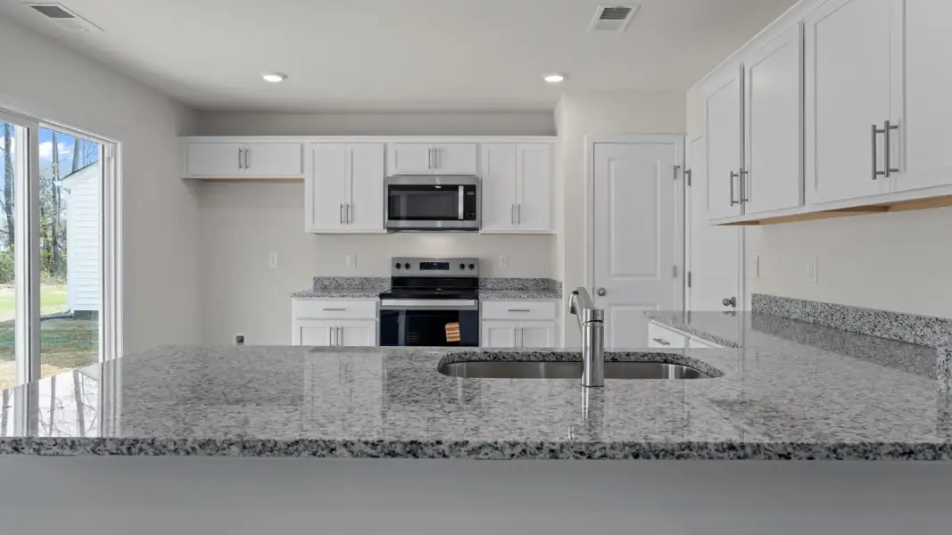 Furnished interior view inside a new home in Jetstream Park, Wilson (Image 9).