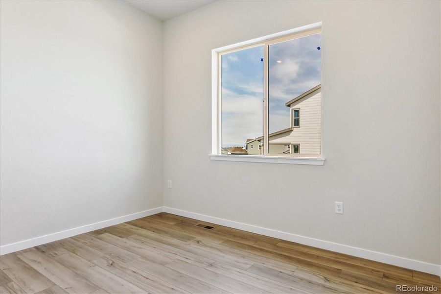 Spacious, unfurnished interior of a new home in Trails at Smoky Hill, Parker (Image 11).