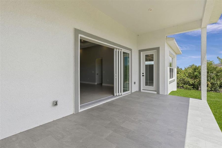 Exterior details and patio area of a home in , Port Charlotte (Image 34).