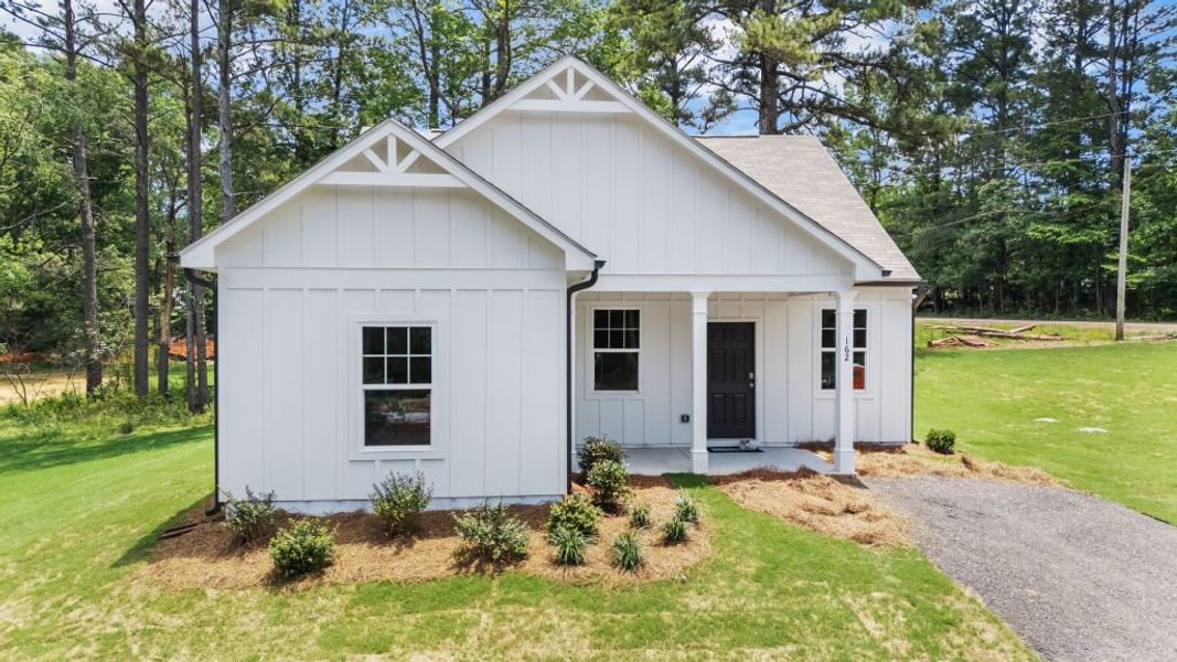 Front exterior of a new home in Clemit Harris Place, Newnan, GA, highlighting curb appeal (Image 2).