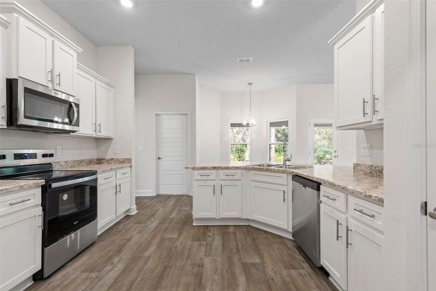 Representative furnished interior of a home built from the 2265 by Adams Homes in Veria, Oak Hill (Image 7).