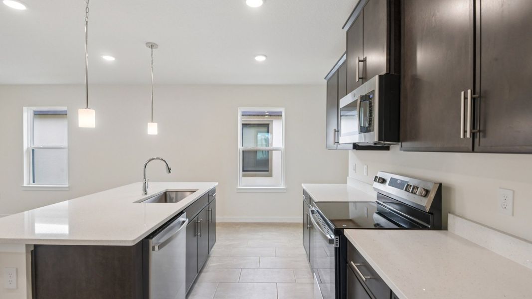 Furnished interior view inside a new home in Grasslands West, Lakeland (Image 11).