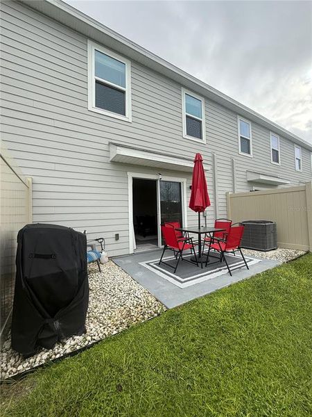 Exterior details and patio area of a home in The Towns at Laurel Commons, Ocala (Image 29).