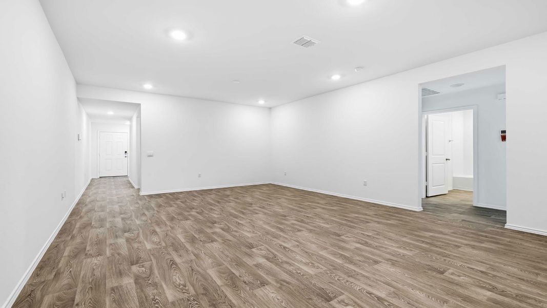 Representative unfurnished interior of a home built from the The Magnolia by D.R. Horton in Palomino, Manor (Image 12).