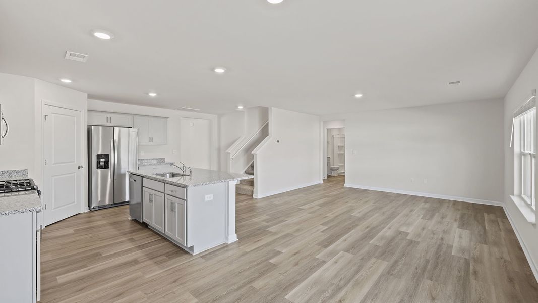 Furnished interior view inside a new home in Bentley Park, Greenwood (Image 5).