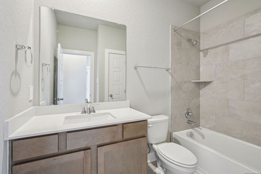 Furnished interior view inside a new home in Legendary Trails - Premier Series, Cibolo (Image 9).