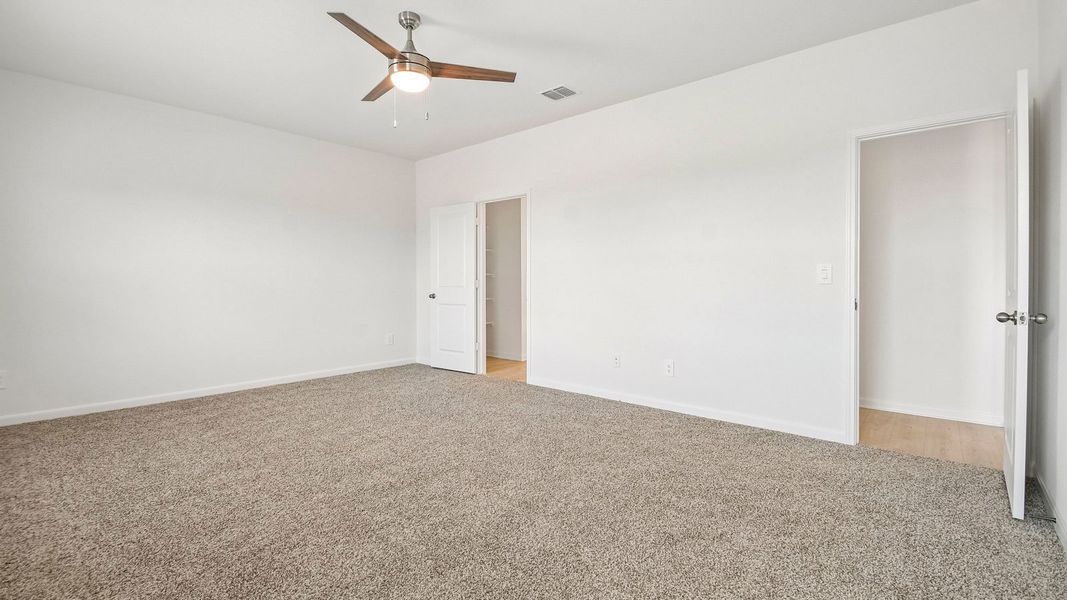 Spacious, unfurnished interior of a new home in Revelry, Del Valle (Image 24).