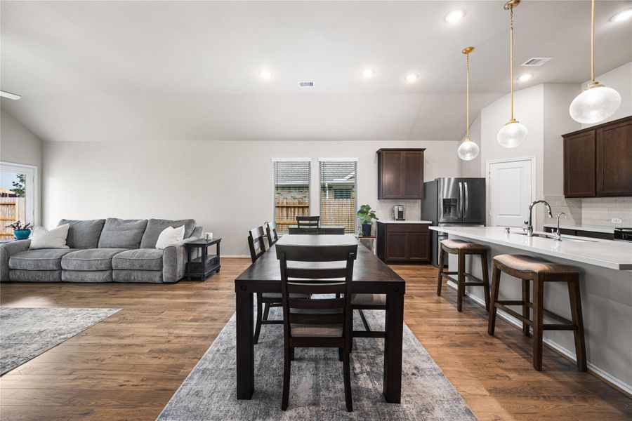 Dining space connects kitchen and living room