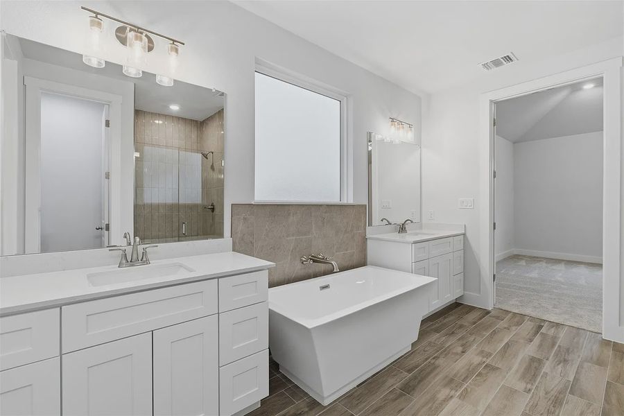 Representative furnished interior of a home built from the Oliver 2015 S TLT by Saratoga Homes in Lakeside at Tessera on Lake Travis, Lago Vista (Image 9).