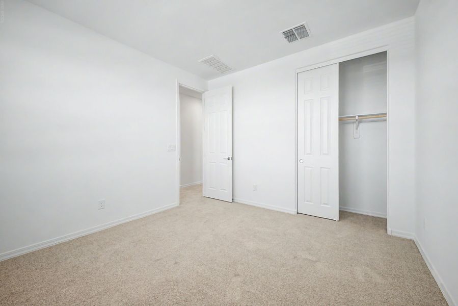Spacious, unfurnished interior of a new home in Tyler Ranch, Buckeye (Image 14). Spacious, unfurnished interior of a new home in Tyler Ranch, Buckeye (Image 14).