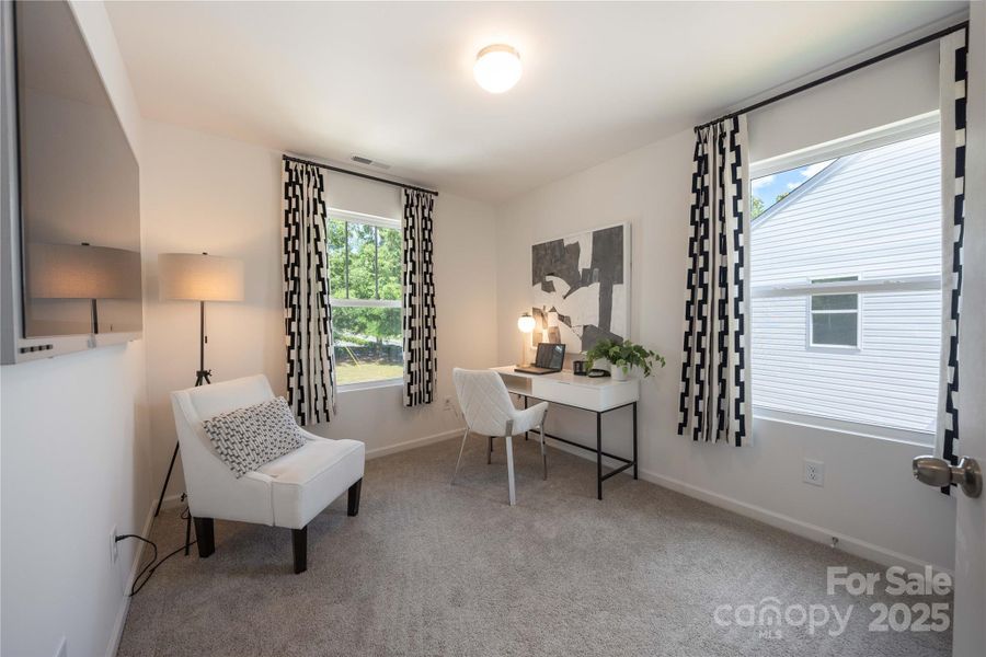 Furnished interior view inside a new home in Dukes Ridge, Charlotte (Image 7).