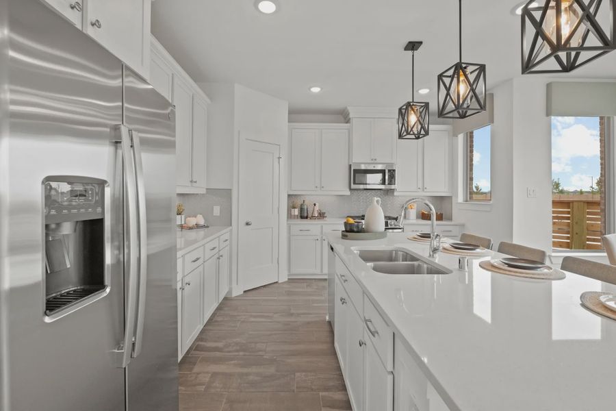 Representative furnished interior of a home built from the Capeside by Chesmar Homes in Elyson Courtyard Collection, Katy (Image 4).