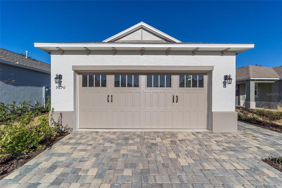 Front exterior of a new home in On Top of the World Communities, Ocala, FL, highlighting curb appeal (Image 20).