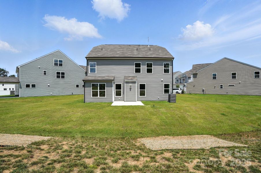 Front exterior of a new home in Hampton Woods, Charlotte, NC, highlighting curb appeal (Image 20).