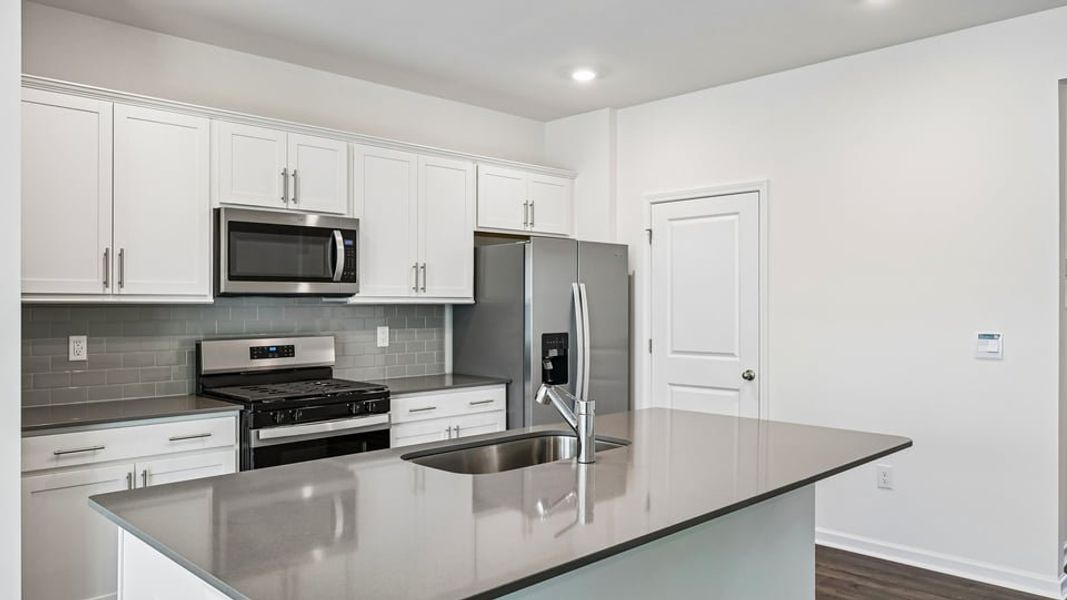 Furnished interior view inside a new home in The Villas at Laurel Oaks, Sanford (Image 7).
