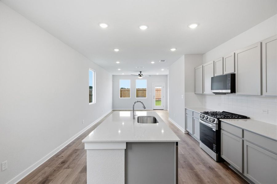 Furnished interior view inside a new home in Stallion Run, Buda (Image 6).