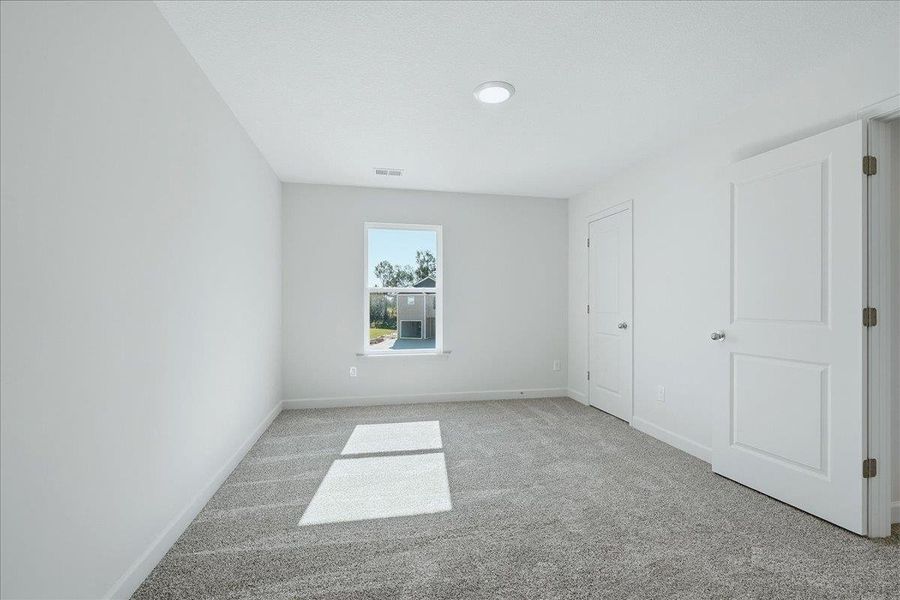 Spacious, unfurnished interior of a new home in Stones Throw, Inman (Image 24).