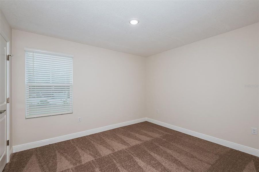 Spacious, unfurnished interior of a new home in Pasadena Landing, Wesley Chapel (Image 17).