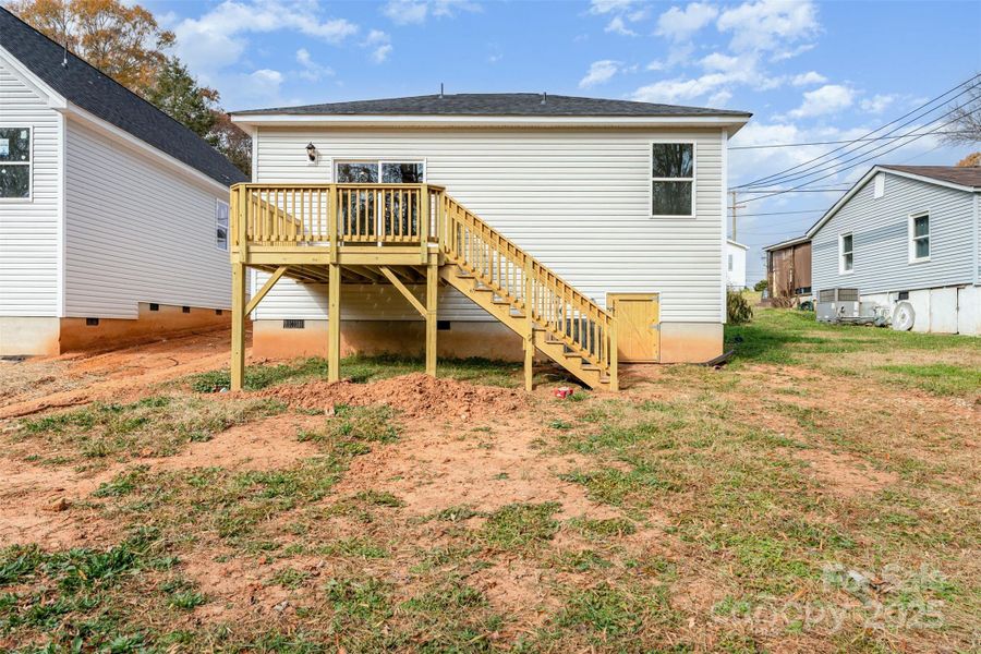Exterior details and patio area of a home in , Lowell (Image 3). Exterior details and patio area of a home in , Lowell (Image 3).