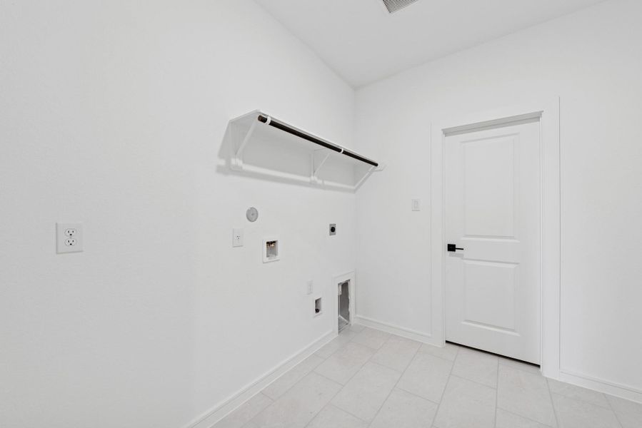 Laundry room (*Photo not of actual home and used for illustration purposes only.)