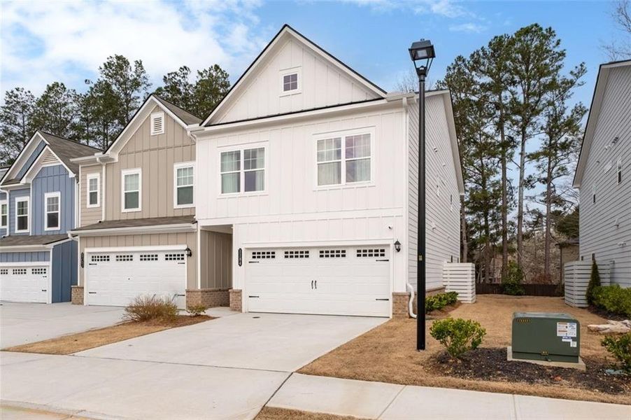 Front exterior of a new home in , Sugar Hill, GA, highlighting curb appeal (Image 23).