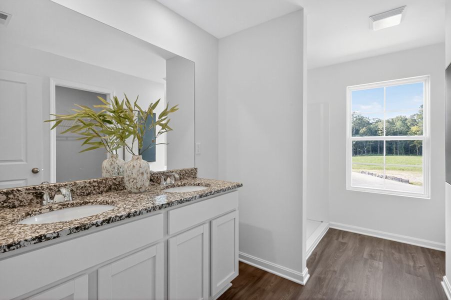 A bathroom with a large window.