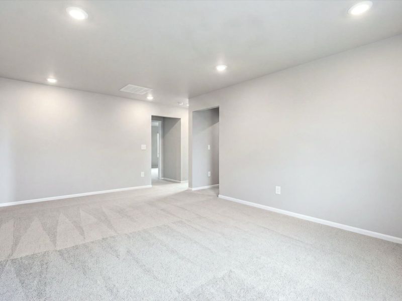Spacious, unfurnished interior of a new home in Poudre Heights: The Lakes Collection, Windsor (Image 14). Spacious, unfurnished interior of a new home in Poudre Heights: The Lakes Collection, Windsor (Image 14).