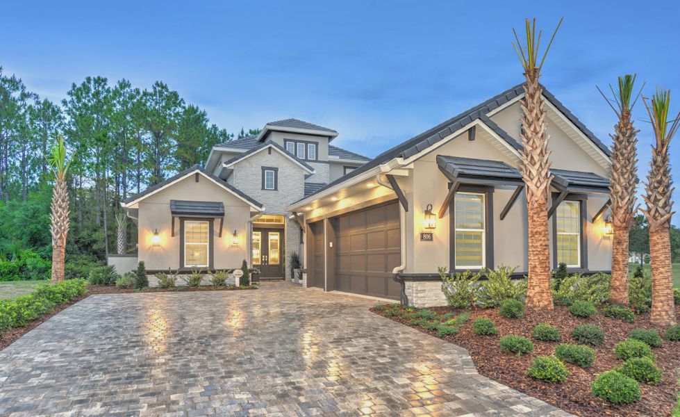Front exterior of a new home in The Conservatory at Hammock Beach, Palm Coast, FL, highlighting curb appeal (Image 21).