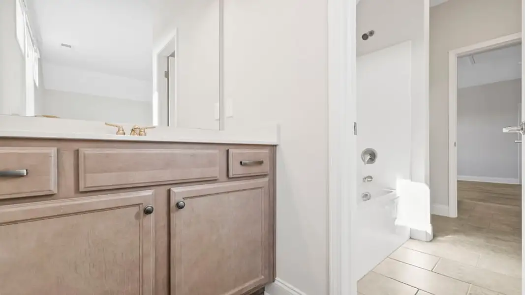 Representative furnished interior of a home built from the Crestone by D.R. Horton in Blue Ridge Trail, Fountain Inn (Image 9).
